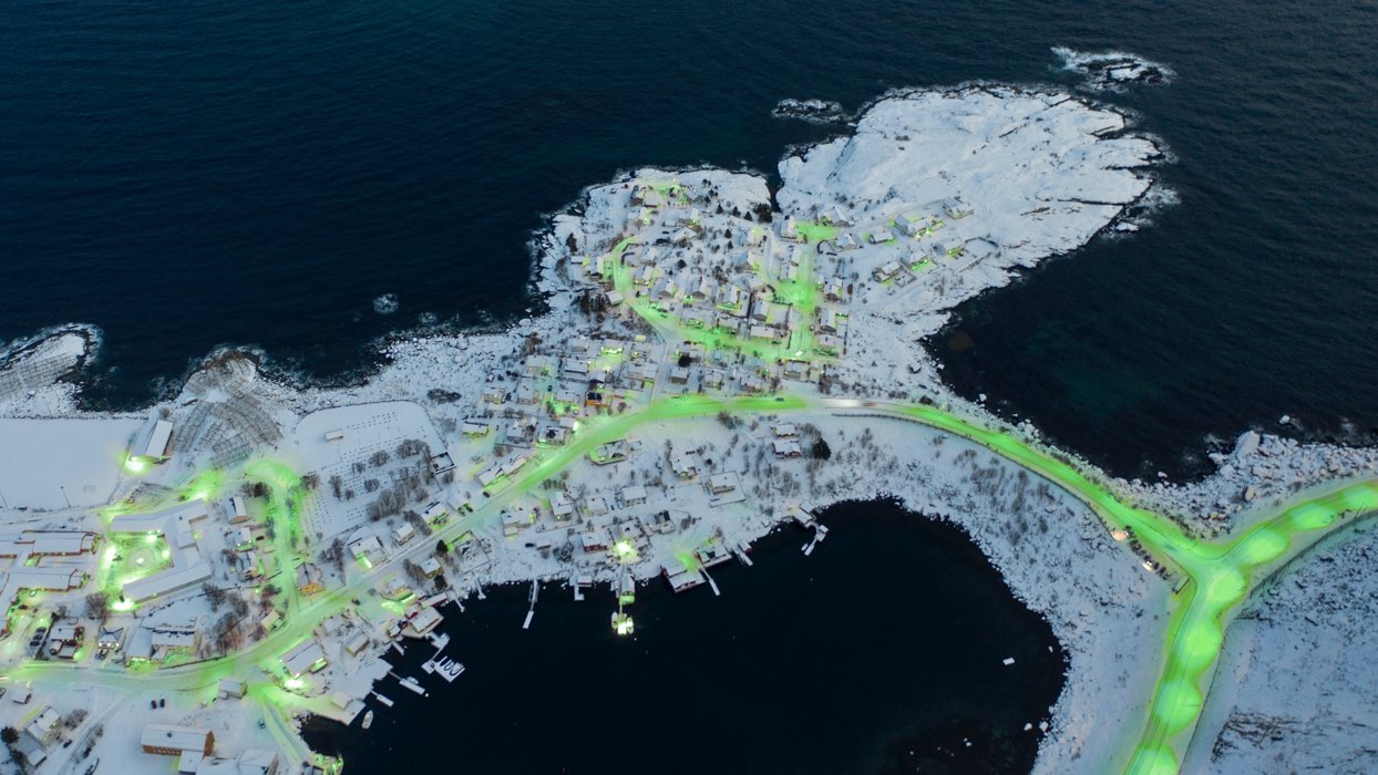 Green lit aerial view of a winter city scape