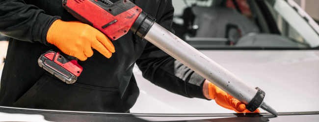 Adhesives - Applying Glue to Car - 650x250