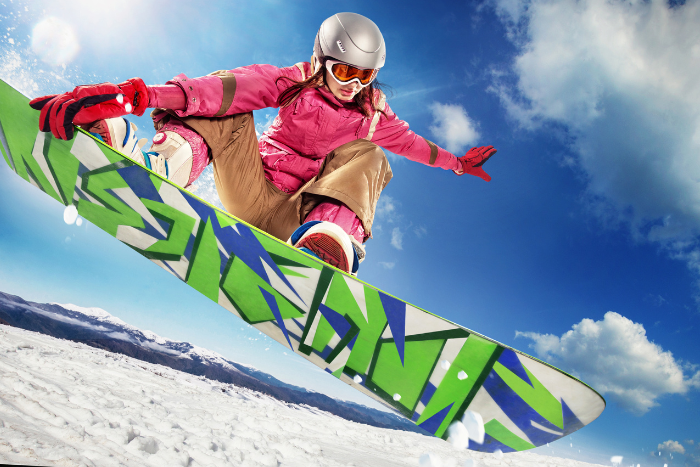 Snowboarder riding snowboard