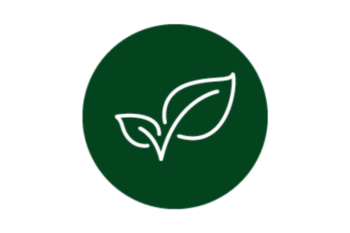green circle with white outline of 2 leaves